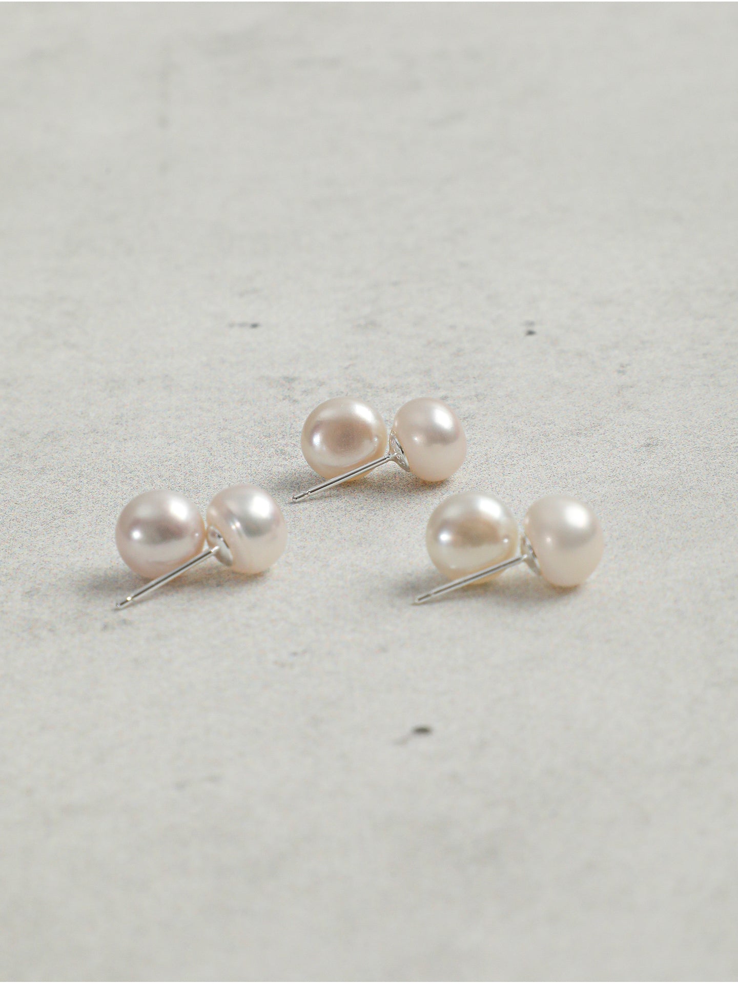 Side view of Earrings, adjustable handcrafted design, quiet luxury jewelry for women