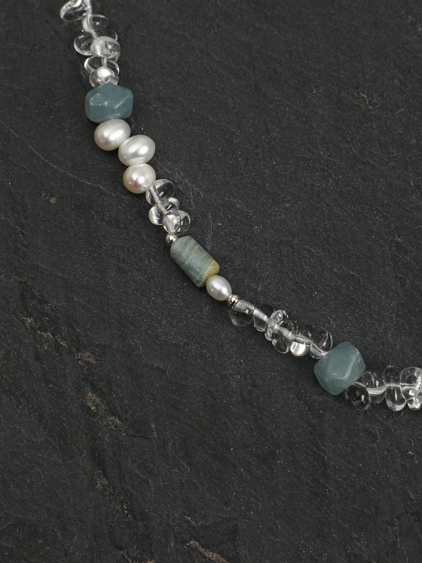Macro close-up of Natural Blue Kyanite and Clear Quartz Choker Necklace ,handcrafted crystal pearl jewelry,925 sterling silver,minimalist luxury gift for women