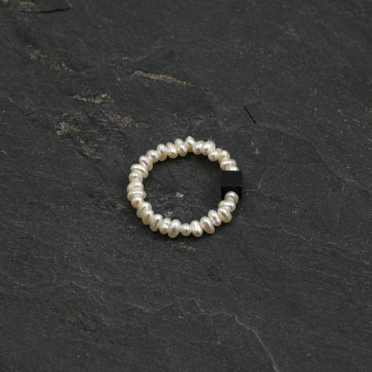 Close-up detail of Ring,natural gemstone and pearl texture,925 sterling silver fine jewelry