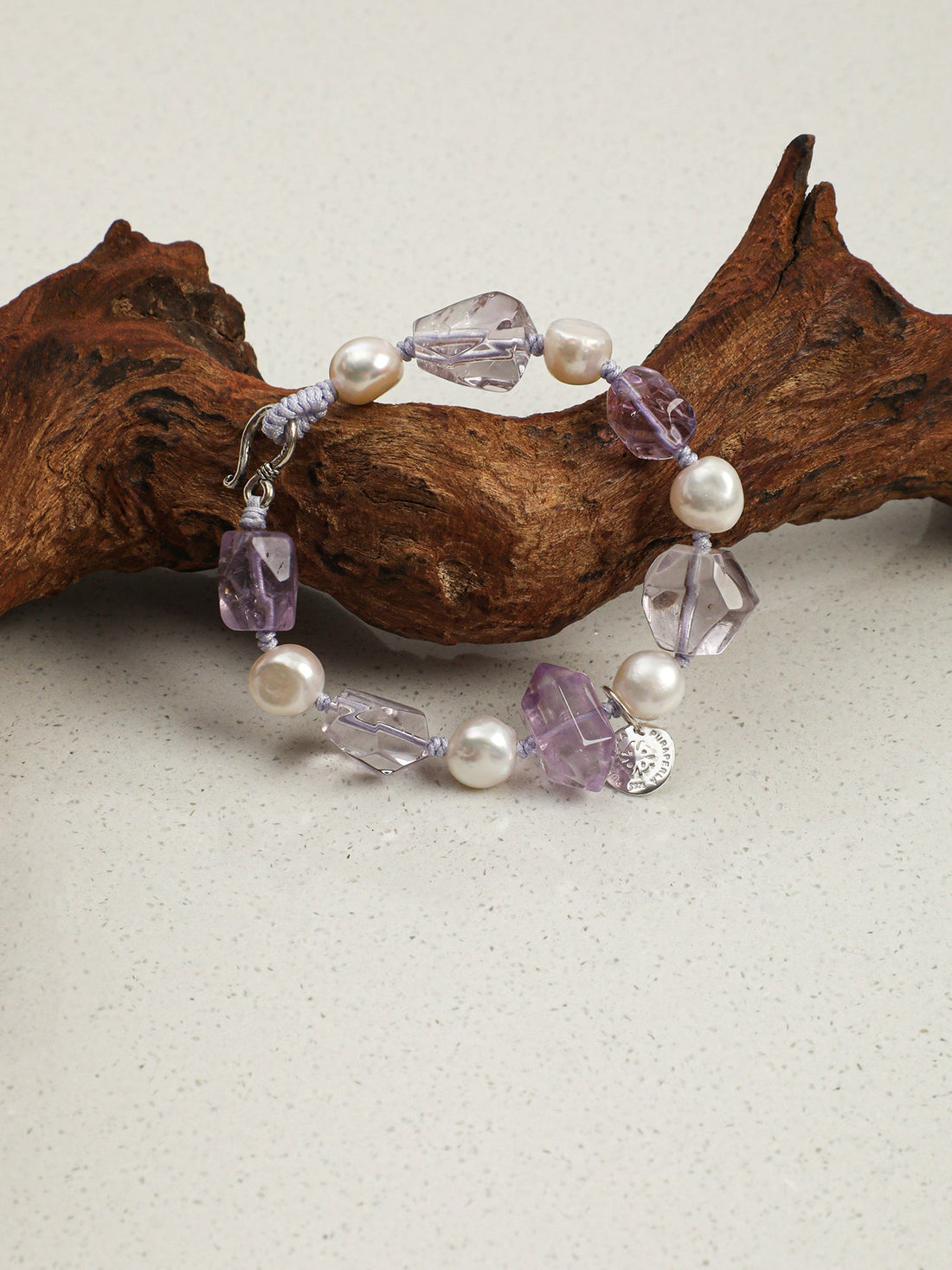 The Poetry of nature Violet & Luster: How to Style the Natural Amethyst & Baroque Pearl Bracelet | Linjora
