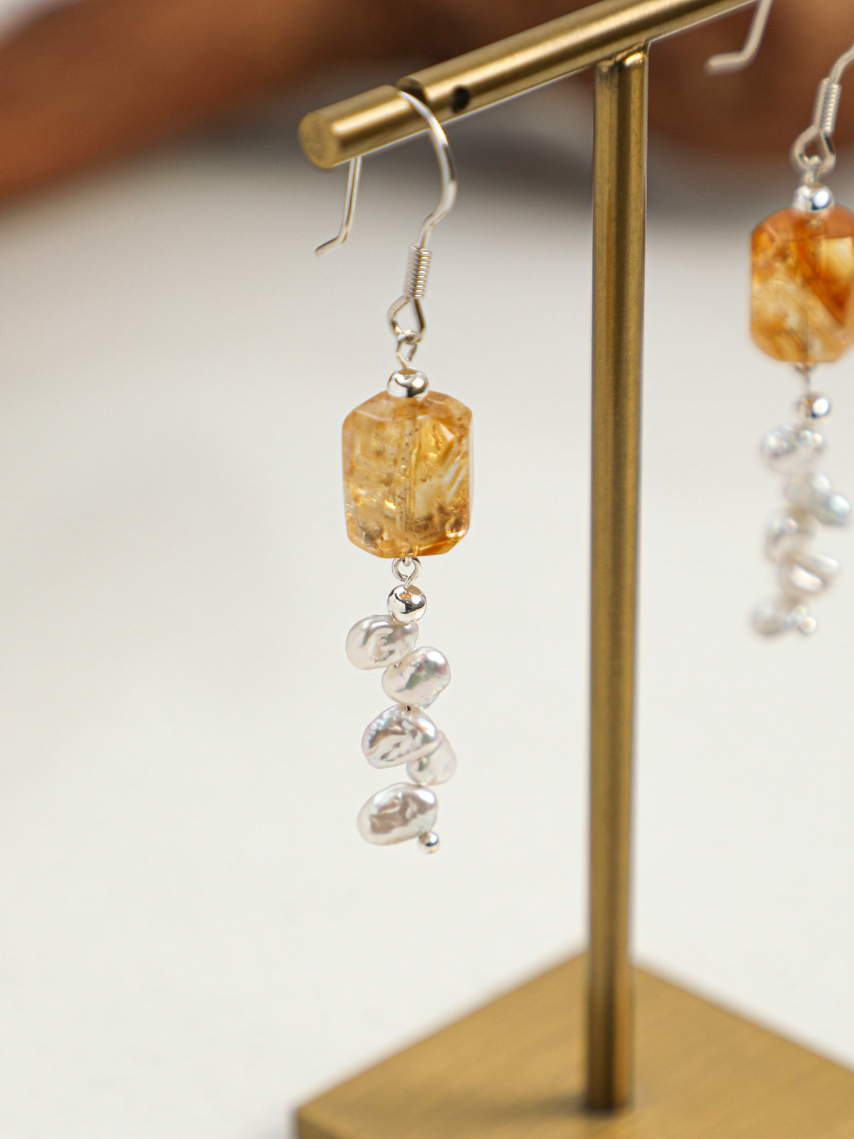 Close-up detail shot  of  Natural Brazilian Citrine and Petal Baroque Pearl Tassel Earrings,handcrafted crystal pearl jewelry,925 sterling silver,minimalist luxury gift for women,drop