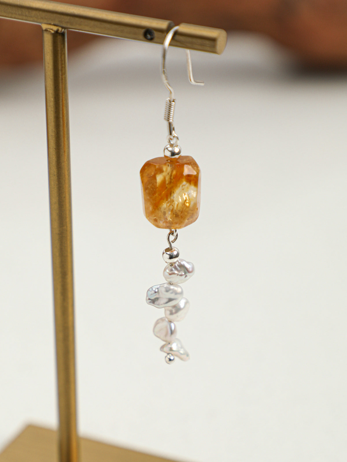 Macro close-up of  Natural Brazilian Citrine and Petal Baroque Pearl Tassel Earrings,handcrafted crystal pearl jewelry,925 sterling silver,minimalist luxury gift for women