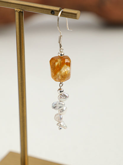 Macro close-up of  Natural Brazilian Citrine and Petal Baroque Pearl Tassel Earrings,handcrafted crystal pearl jewelry,925 sterling silver,minimalist luxury gift for women