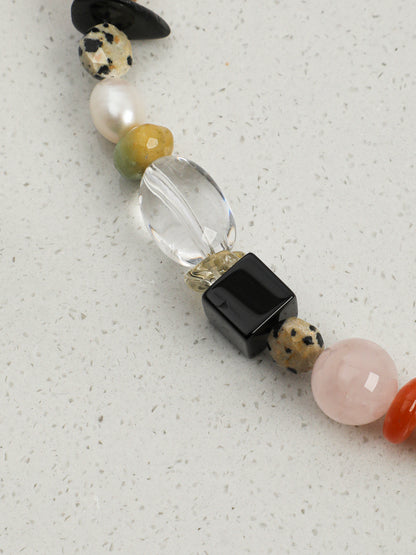 Macro close-up  of Natural Prehnite,Green Quartz,and Baroque Pearl Statement Necklace,natural gemstone and pearl texture,925 sterling silver fine jewelry