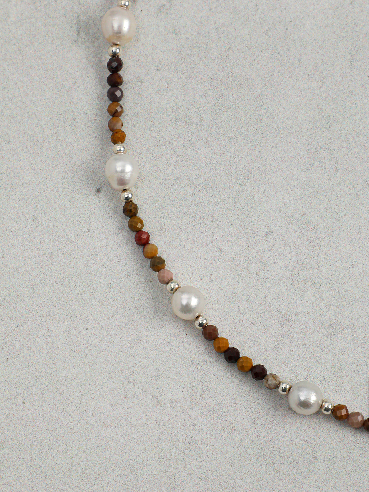 Close-up detail of  Jasper and Lustrous Freshwater Pearl Necklace,natural gemstone and pearl texture,925 sterling silver fine jewelry