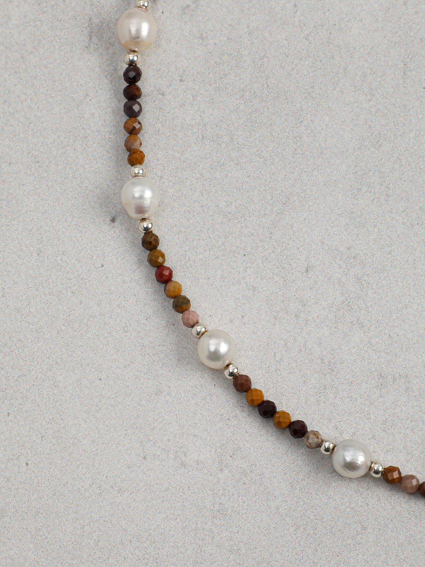 Close-up detail of  Jasper and Lustrous Freshwater Pearl Necklace,natural gemstone and pearl texture,925 sterling silver fine jewelry