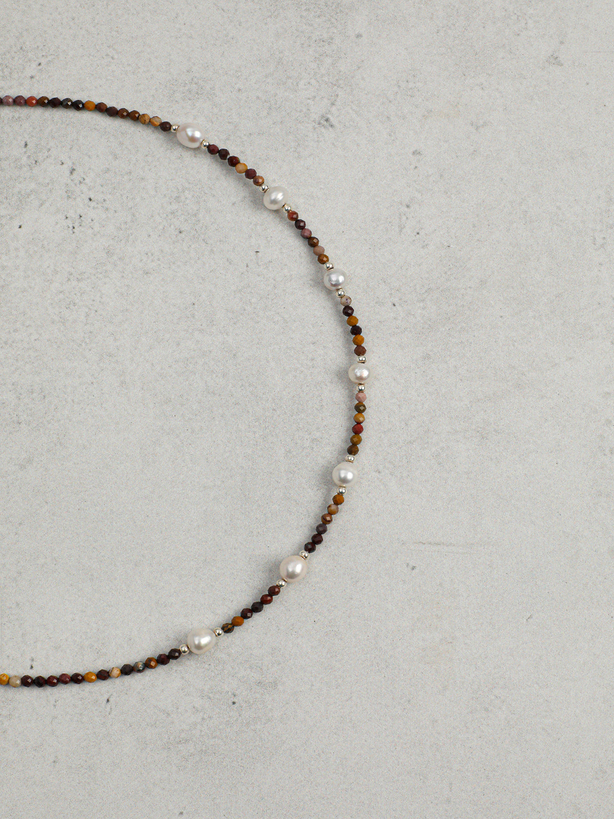 Macro close-up of  Jasper and Lustrous Freshwater Pearl Necklace,natural gemstone and pearl texture,925 sterling silver fine jewelry