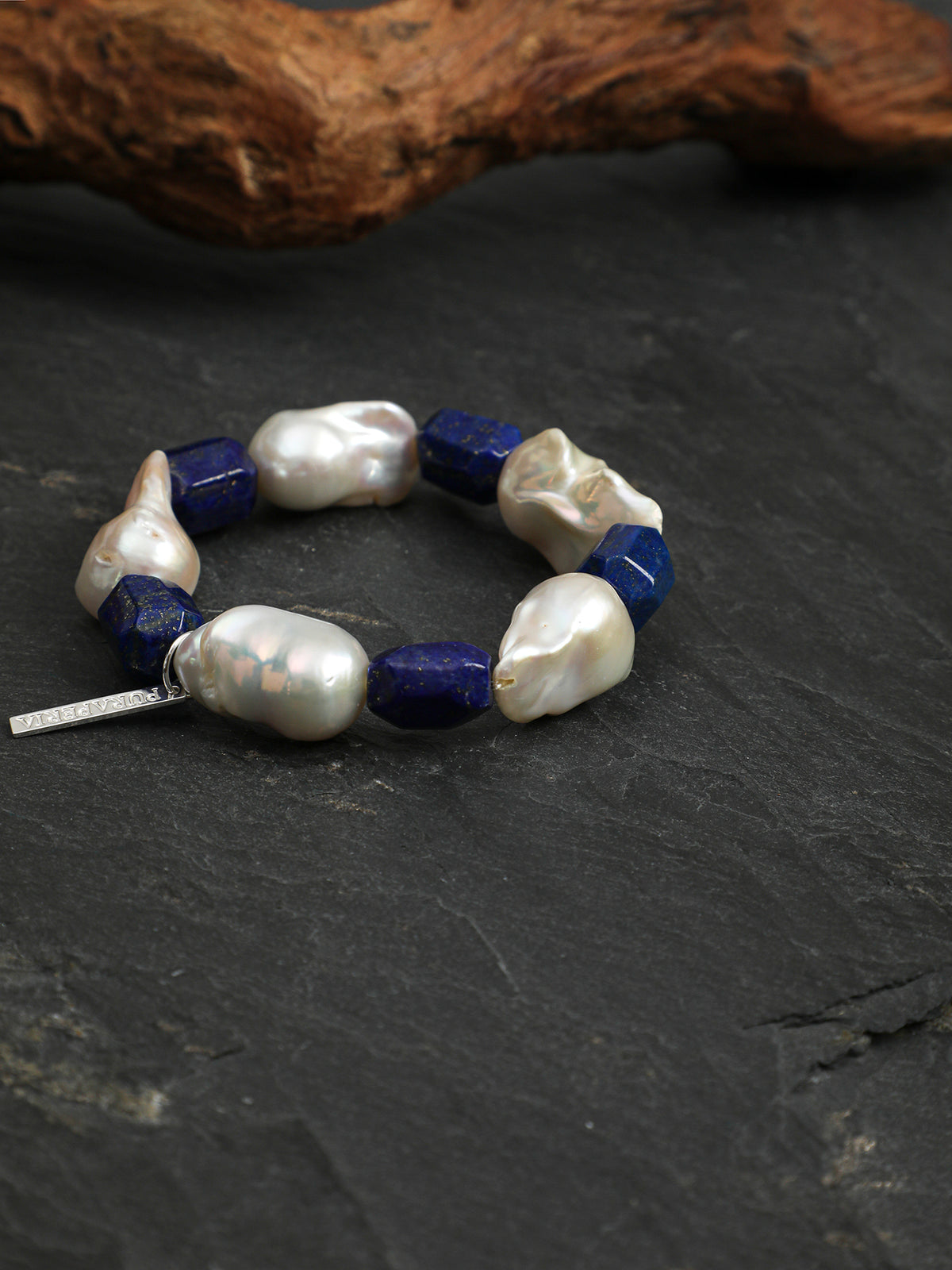 Natural baroque pearl and lapis lazuli bracelet size scale and wrist profile perspective