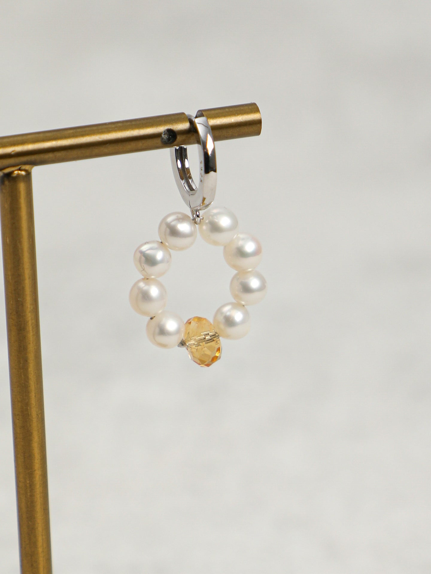 Macro close-up of Natural Seed Pearl Hoop Earrings with Citrine,handcrafted crystal pearl jewelry,925 sterling silver,minimalist luxury gift for women
