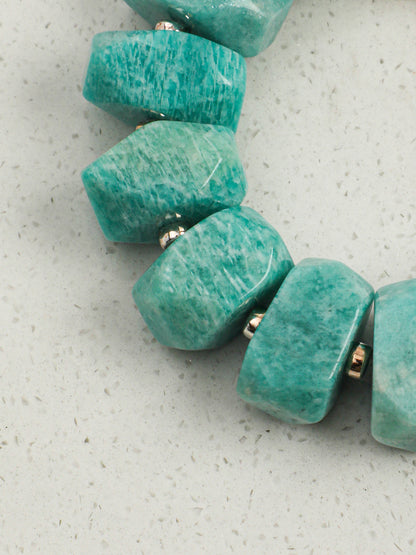 Close-up of freeform natural teal blue Amazonite stones on the Bi Yu Zhi Zhu bracelet