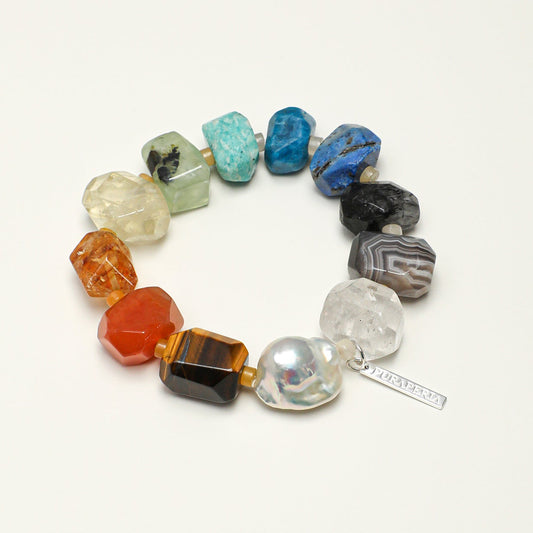 Chunky rainbow natural gemstone and oversized baroque pearl bracelet with S925 silver tag on neutral background